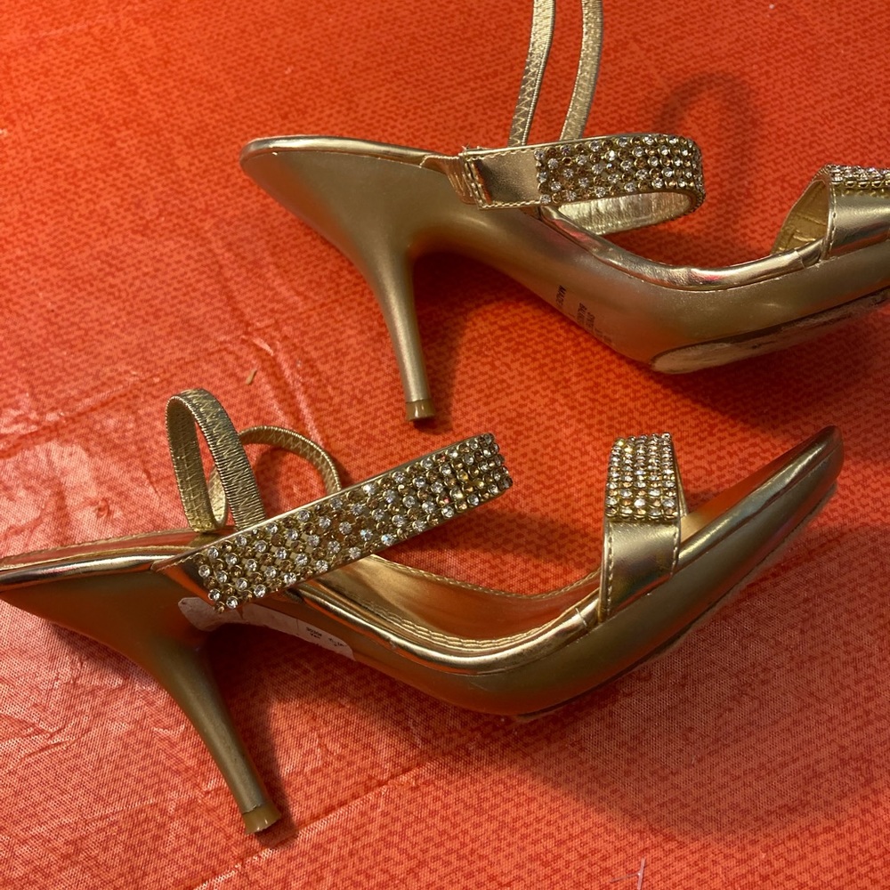 Gold heeled sandals.